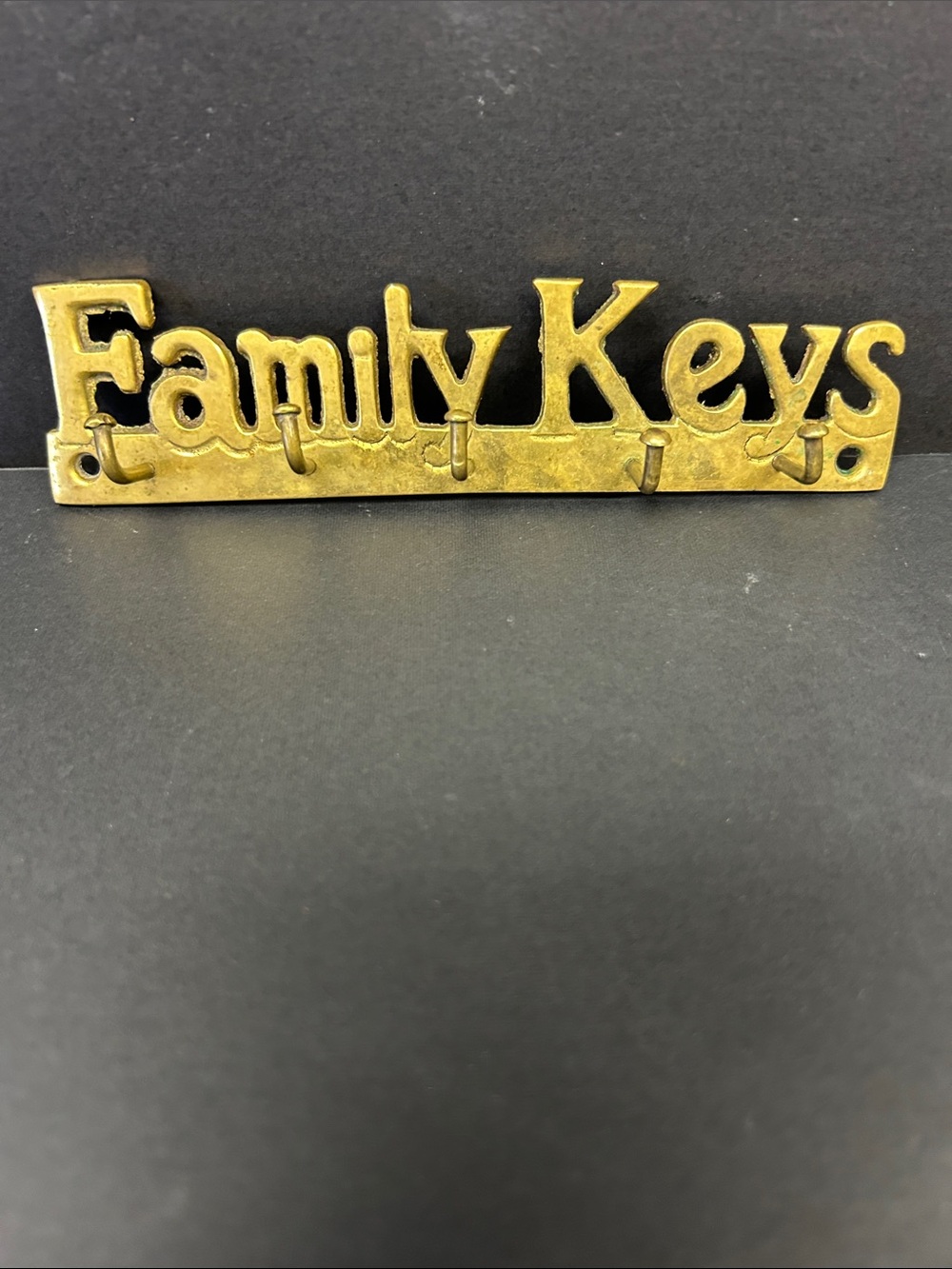 Vintage 6.5 x 1.5  solid brass “Family Kets” 5 hook wall key holder